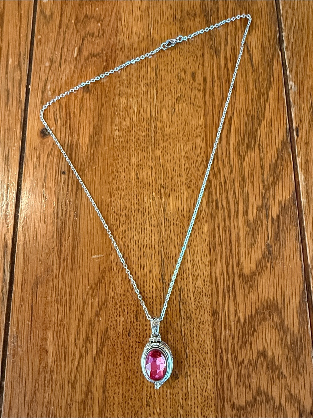 Silver Necklace with Pink Oval Crystal Pendant That Opens. 9-1/2” Chain.